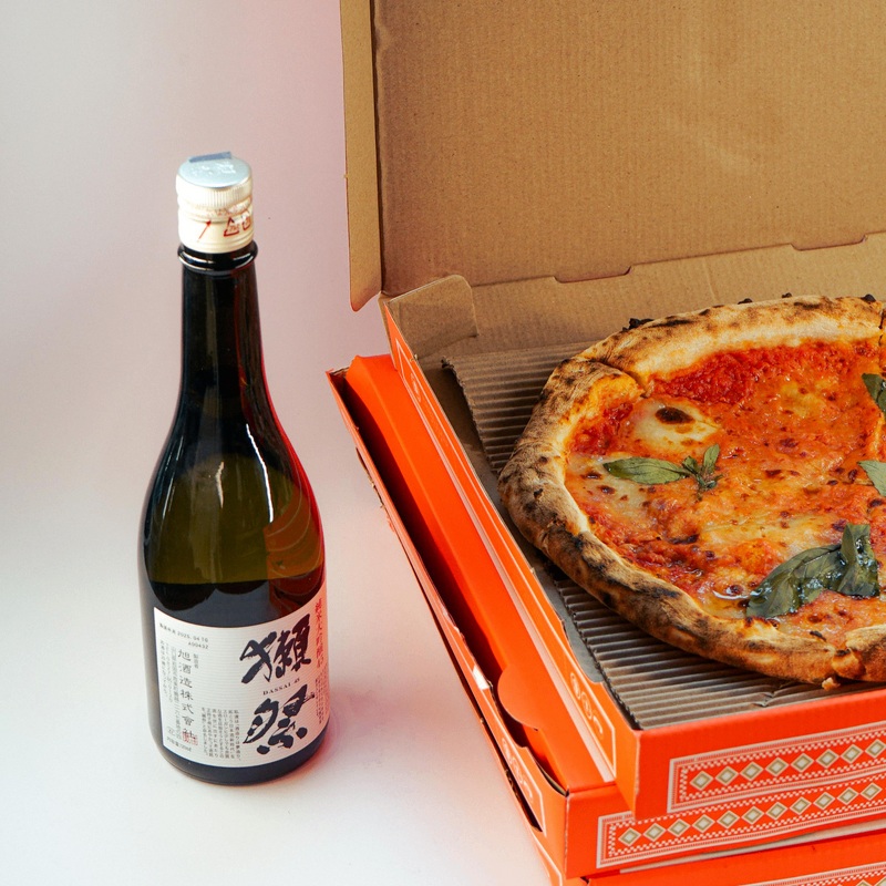 A Funghi E Parmigiano Pizza & 1 Bottle of Sake